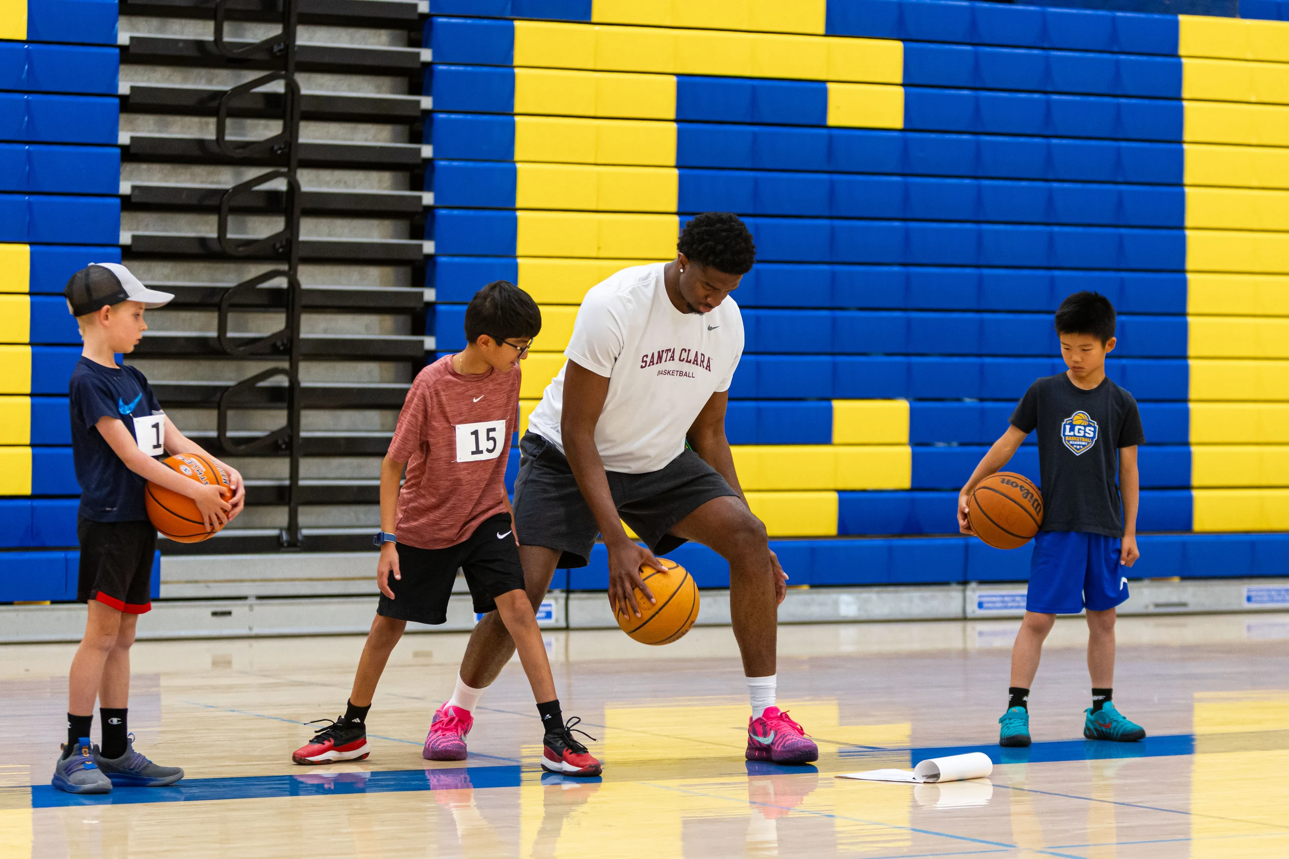 Santa Clara University men's basketball guard driving with the ball