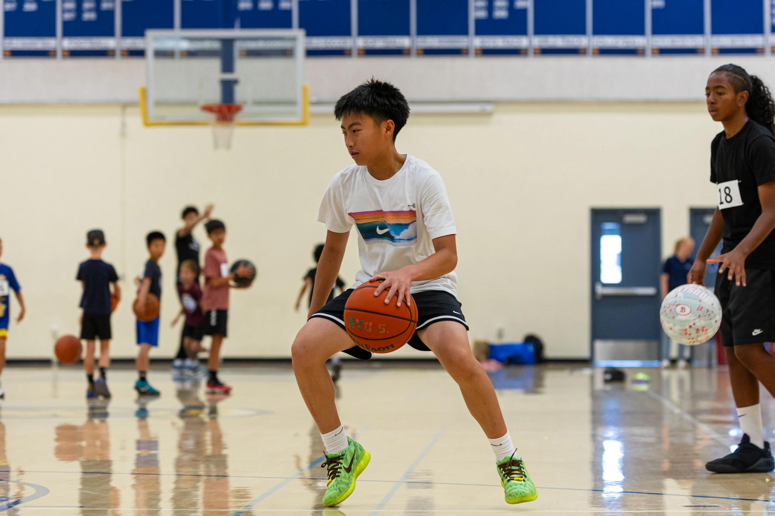 Small-group instruction at the Santa Clara men's basketball camp
